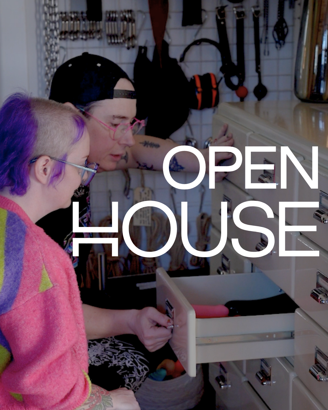 Faded image of two women in a bed with text 'Open House' overlaid. 